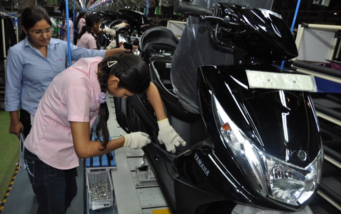 Yamaha's assembly line for its new scooter RAY being run entirely by women.