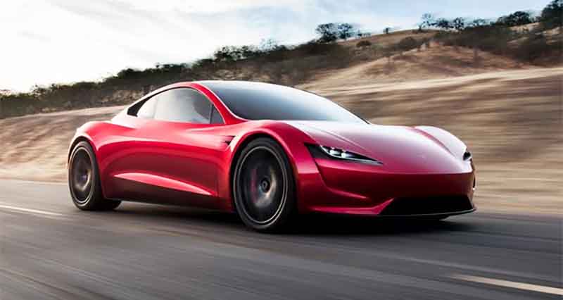 tesla roadster red action photo
